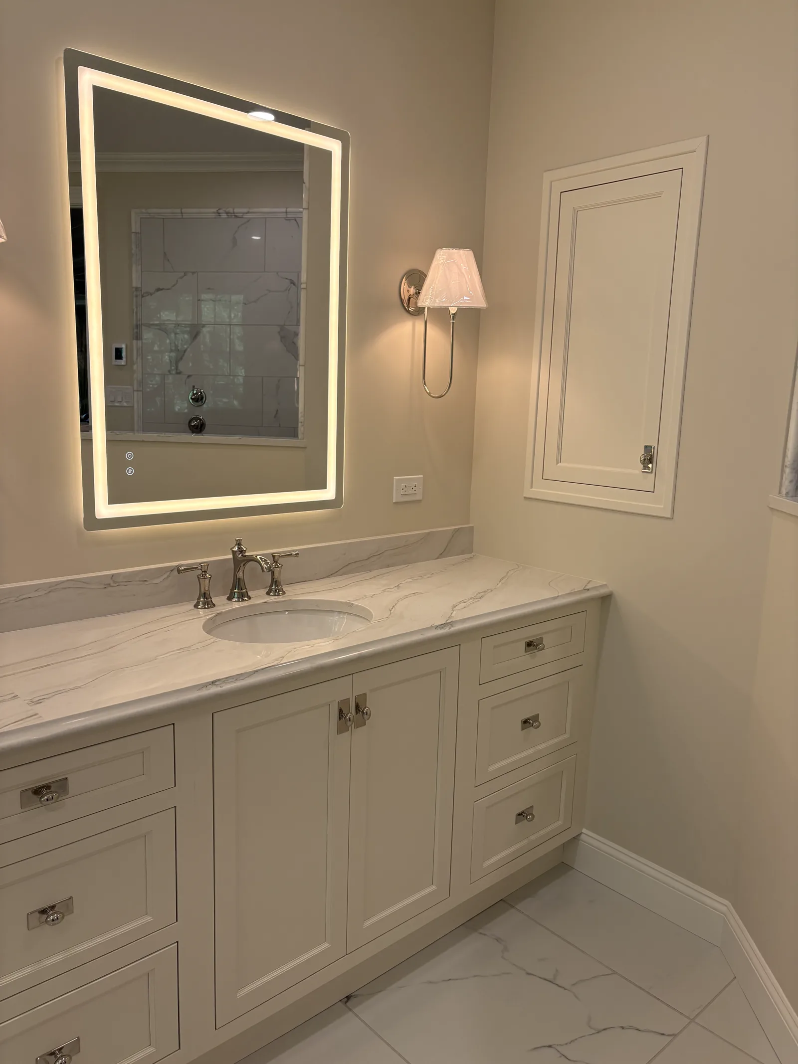A dated bath, reimagined — the finished result by Mac Kitchens