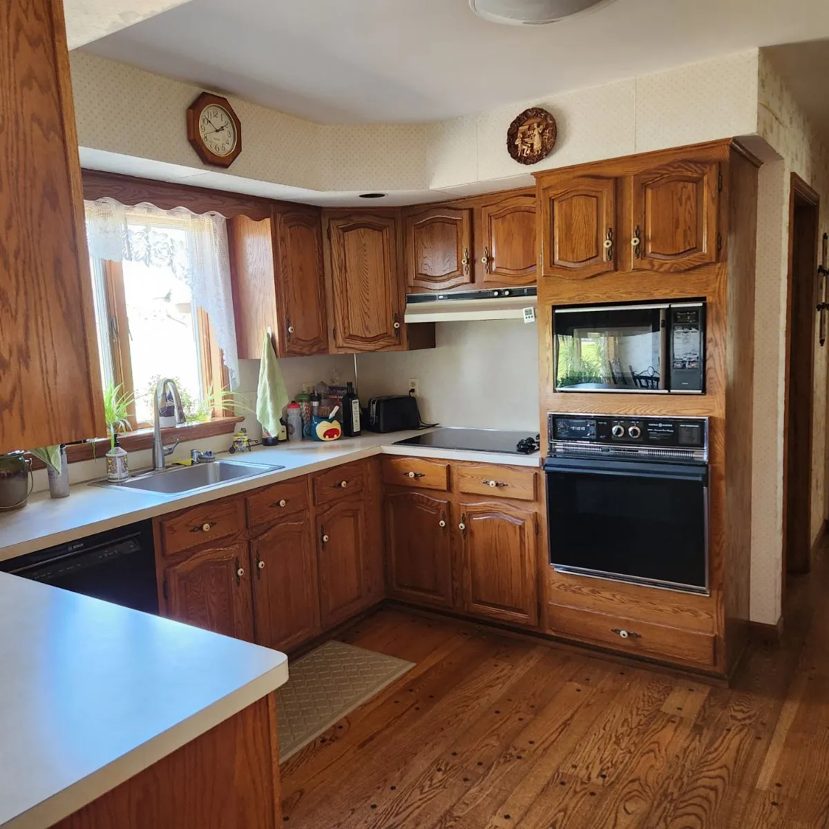 From oak and wallpaper to sage and stone — before Mac Kitchens' remodel