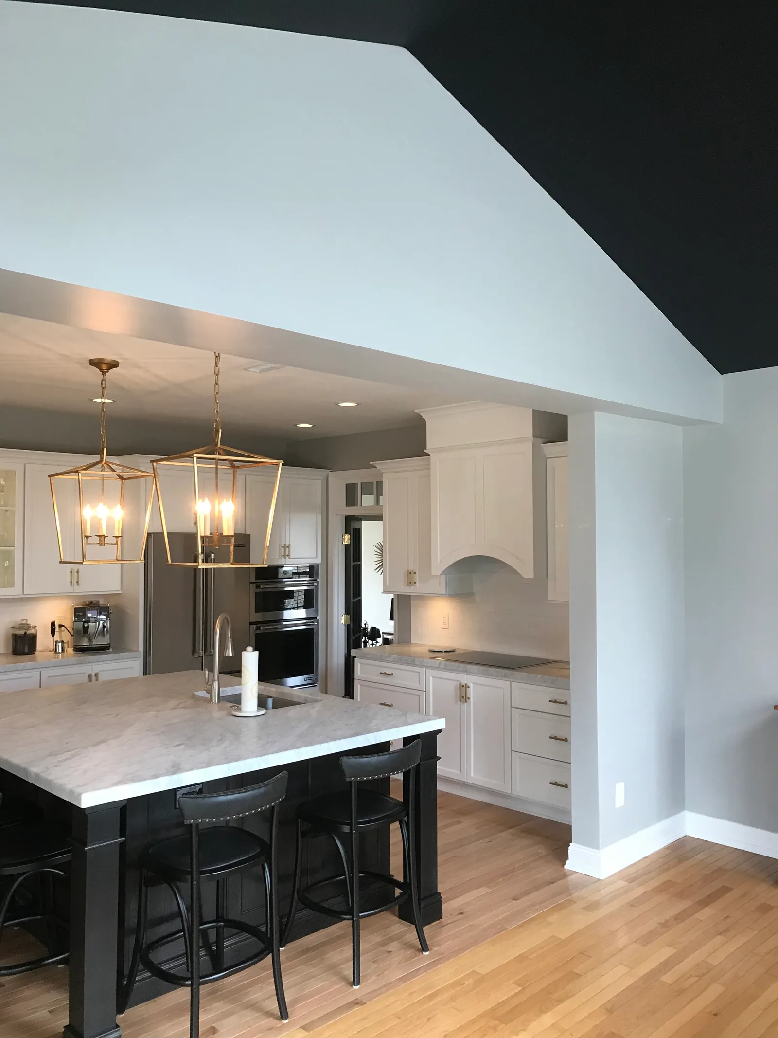 Golden oak, opened up in white — the finished result by Mac Kitchens