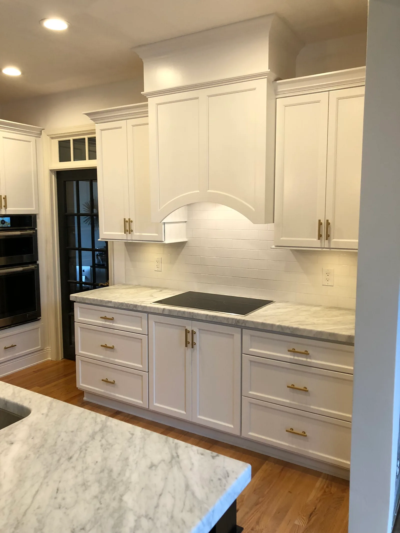 Golden oak, opened up in white — the finished result by Mac Kitchens
